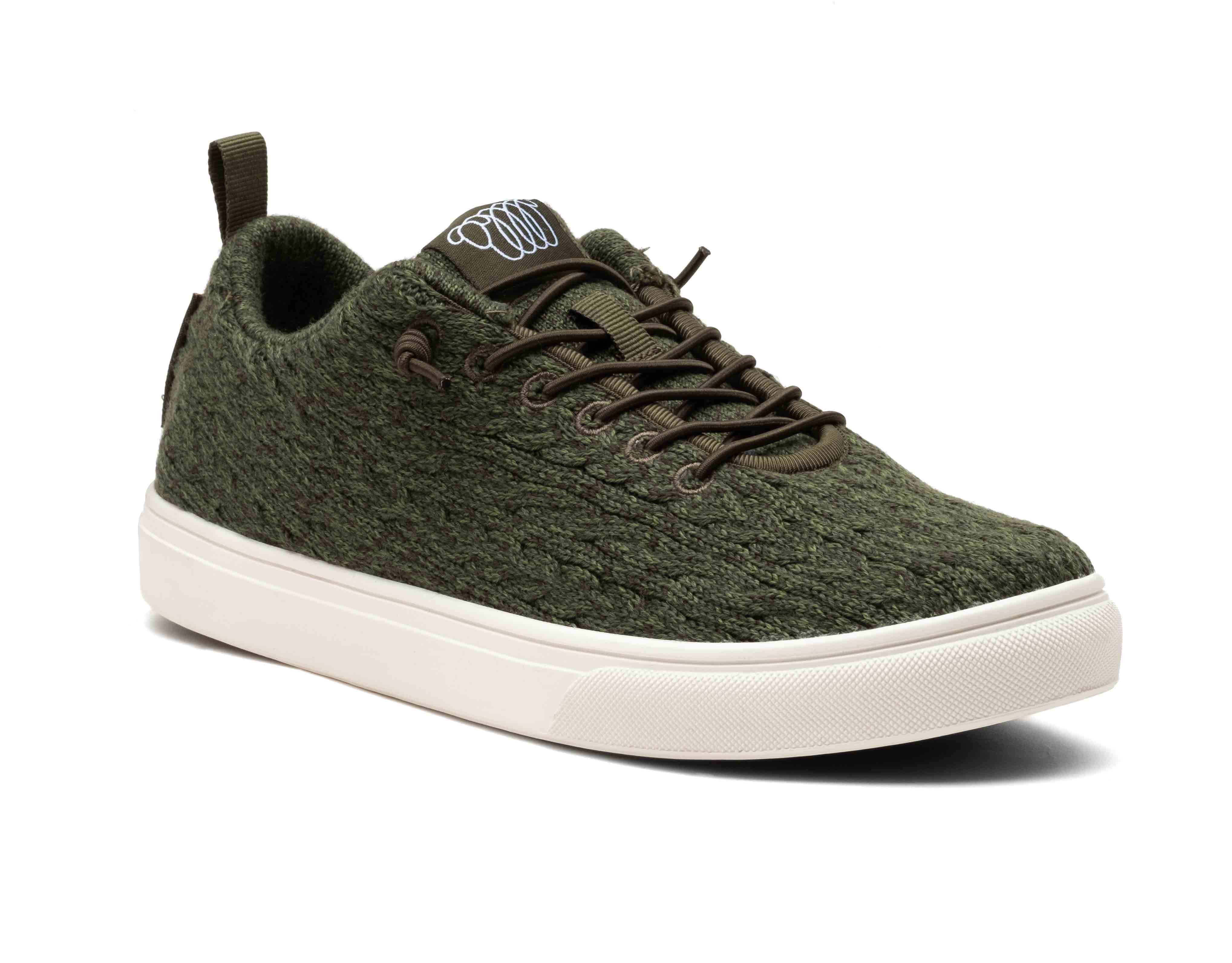 green merino wool cooma with breathable fabric, white sole, and back pull tab for easy wear.
