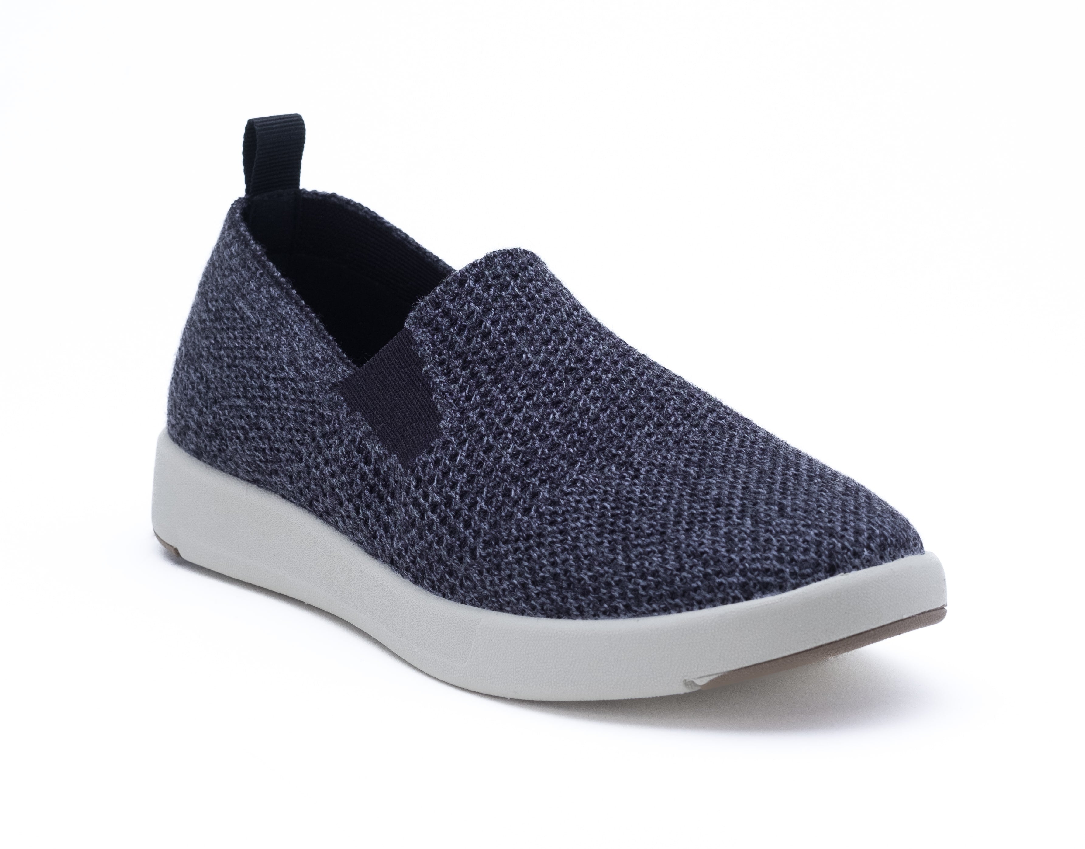black merino wool suffolk with breathable fabric, while sole, and back pull tab for easy wear.